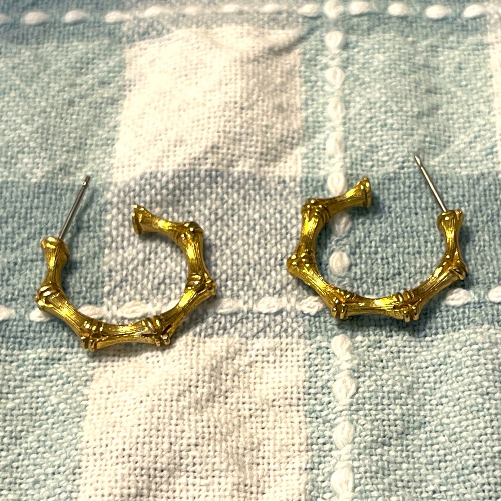 Gold toned half hooped earrings